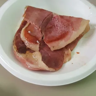 a plate of ham and rice