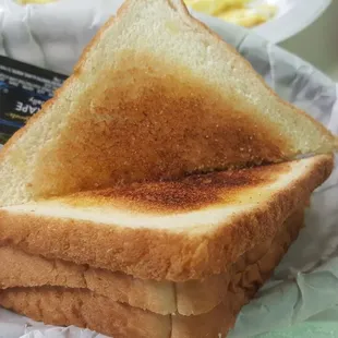 a toasted sandwich in a basket