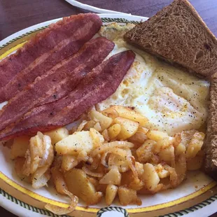bacon, eggs, potatoes and toast