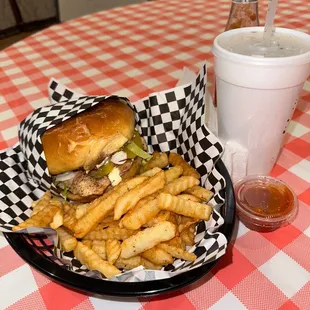Chicken breast sandwich, French fries, and drink