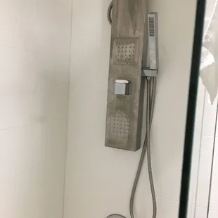 This contraption?  After getting power washed before his shower, he was able to get the water to come only from the wand