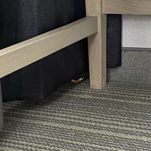 Cigarette under desk even though this is a non smoking hotel