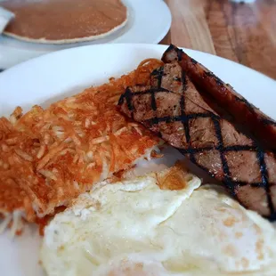Chicken apple sausage and eggs over easy with hash browns
