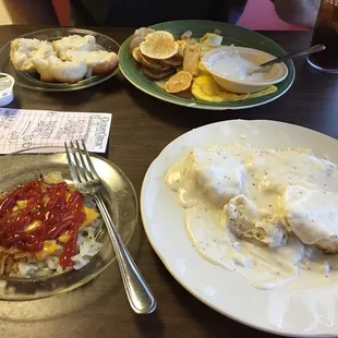 Western omelette, hashbrowns smothered and covered, biscuits and gravy, and home fries.