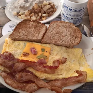 Western omelette bacon ritos sausage gravy over biscuit home fries