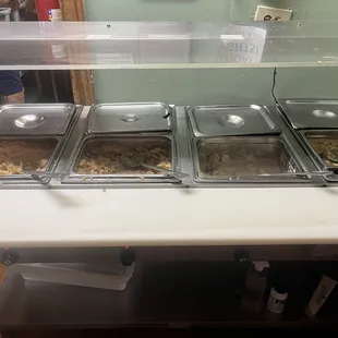 Dessert bar: L-R peach cobbler, apple crisp, banana pudding, and bread pudding