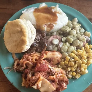 Lasagna, corn, Lima beans, mashed tasters and meatloaf.