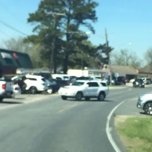 Parking lot is so full, you might have to park across the street