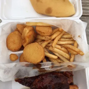These hog wings flew off the plate! With fried squash, French fries and a yeast roll.
