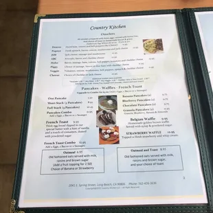 a menu and a cup of coffee