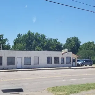 a truck parked in front of the building