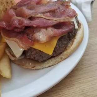 a bacon cheeseburger and french fries