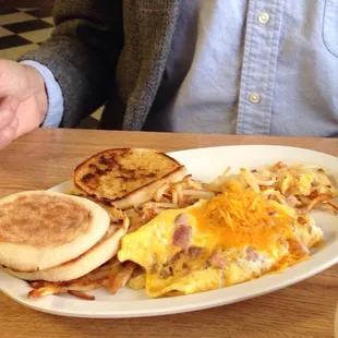 Bacon omelet with hash browns and English muffin for $9. Yum!