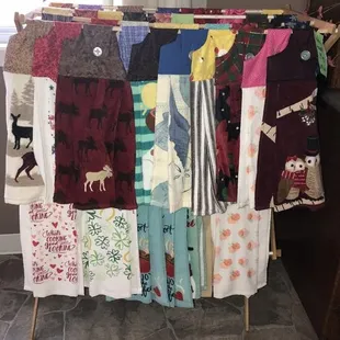 a quilt hanging on a clothes rack