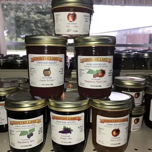 a stack of jars of jams