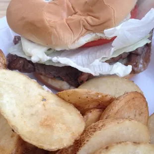 Ribeye sammich and home fries.  Hot and fresh