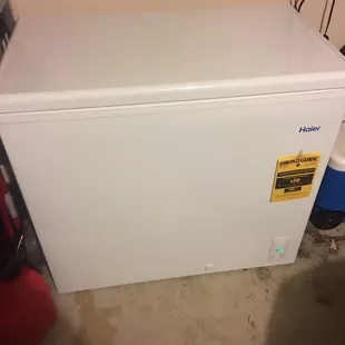a small white refrigerator