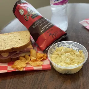 Reuben, macaroni salad, barbeque chips. The meal deal lets you add chips and a water/pop/tea for $1.75.