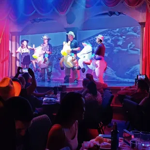 a group of people on stage