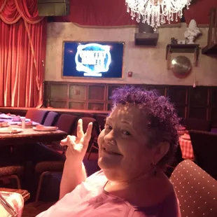 a woman sitting in a restaurant