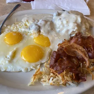Country Breakfast - 3 eggs, bacon (or option ofsausage patties), a biscuit with sausage gravy, &amp; hash browns.   So filling!!
