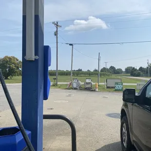 a truck at a gas station