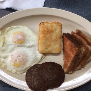 Deep-fried hash brown patty, tiny toast.