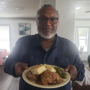 Local mayor sampling the groceries