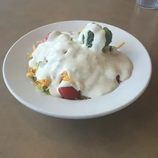 My boyfriend wanted to see how much dressing he could put on a salad.