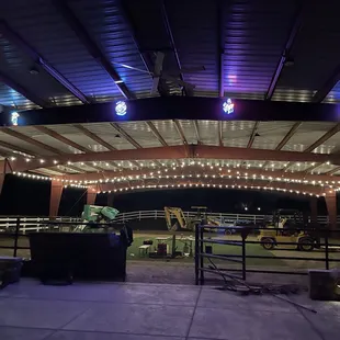 Arena is getting decked out with wedding Bistro lights and drapery!  looking good!!