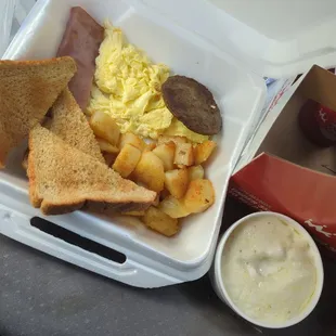 Eggs, grits, sausage, and toast. Perfect!