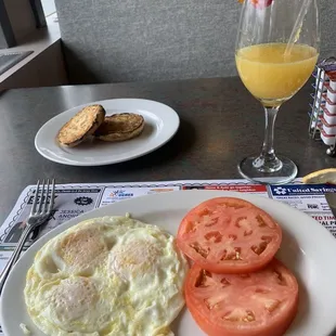 Three Country Fresh 3 over medium Eggs, english muffin, tomatoes