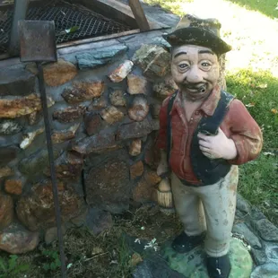 Little man protecting the grill.