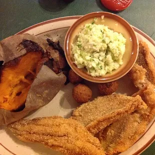 All you can eat fish, sweet potato and slaw. (Slaw was very bland, I didn't eat it)