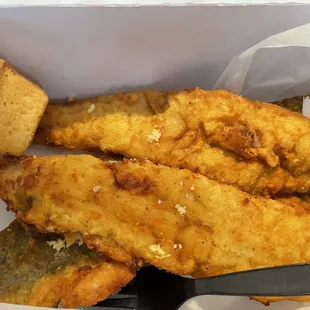 3 piece whiting fish with 2 pieces of cornbread. Missing one cornbread