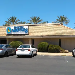 Just what you&apos;d expect in Citrus, Rancho, Foothill Farms - vertical siding and a mansard, too!  Kudos for palm trees and perfect blue skies.