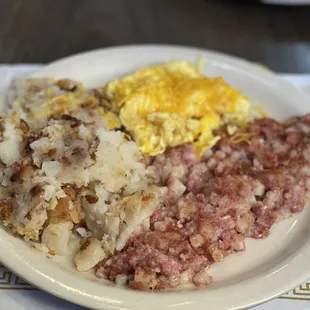 Hash, potatoes and cheese eggs