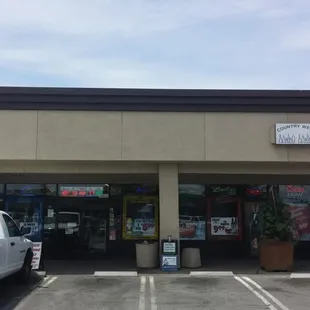 Front of the store in the Harbor Blvd Shopping Center. (Behind Pizza Guys)