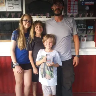 Pitmaster Rob and his three kids who have proven to be great workers, helping out at the new storefront.