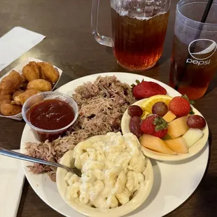 Pulled Chopped Pork Barbeque - Regular, Mac &amp; Cheese - Regular, Fresh Fruit, Hushpuppies - Regular