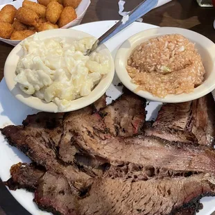 Slice brisket, Mac &amp; cheese, red slaw &amp; hush puppies