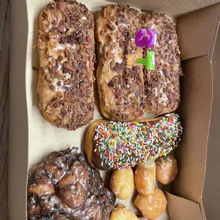 a variety of doughnuts in a box