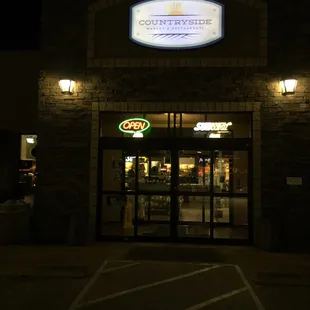 Nighttime storefront.