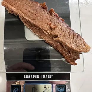 Two slices of brisket is 2 ounces.