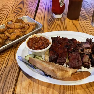 Ribs, burnt ends, beans and onion rings.