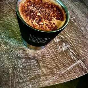 A beautifully made half and half cortado with spicy Colombian cacao in a Klean Kanteen reusable mug.