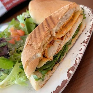 a sandwich and salad on a plate