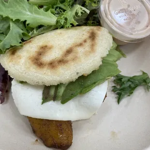 Arepa with plantains, white cheese, and avocado. Comes with a side salad.