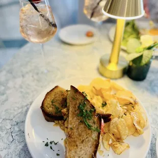 Lobster grilled cheese sandwich with chips