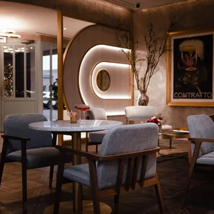 a dining area with chairs and tables